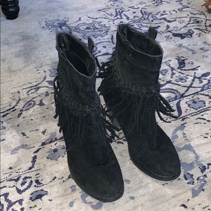 Black fringed cowboy style boots with chunky heel